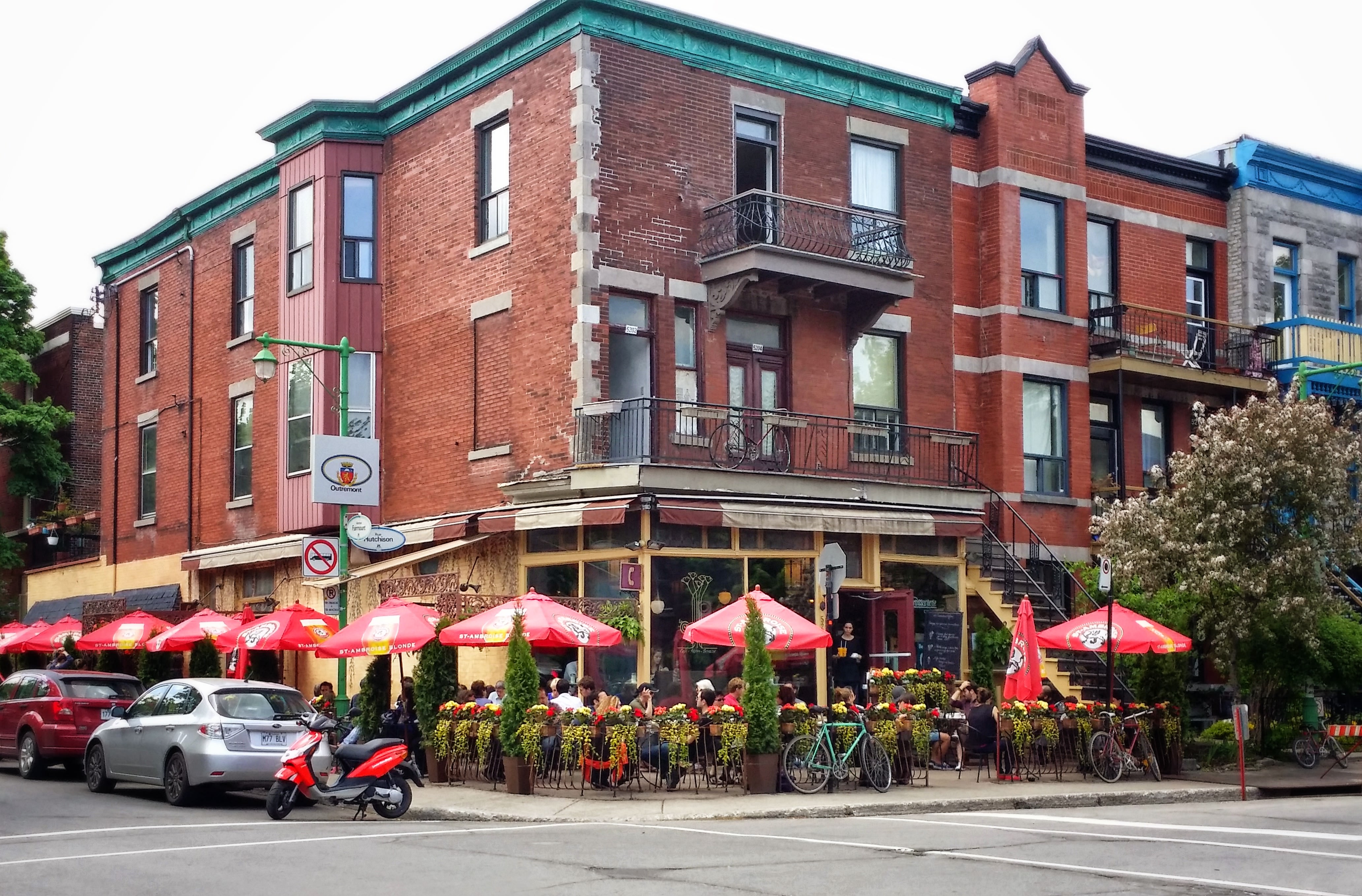 Photo of a house with umbrellas outside